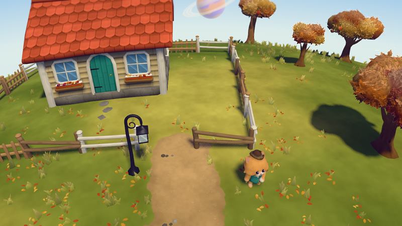 Autumn in the early afternoon: golden trees, red and orange leaves scattered over the lawn, the cottage and the cat landlord beside the path under a pale blue sky
