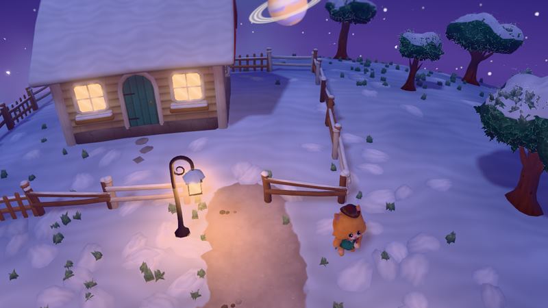 Winter at night: the cottage roof under snow, snow-topped trees, a lamp post glowing warm over the path and the cat standing in the snow